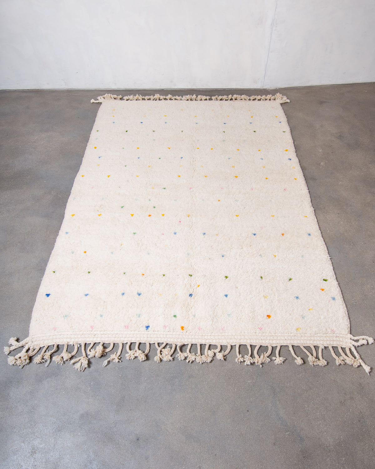 Modern, designer, handcrafted Berber rug from Morocco. Beniourain carpet with beautiful colours and patterns and fluffy wool texture.